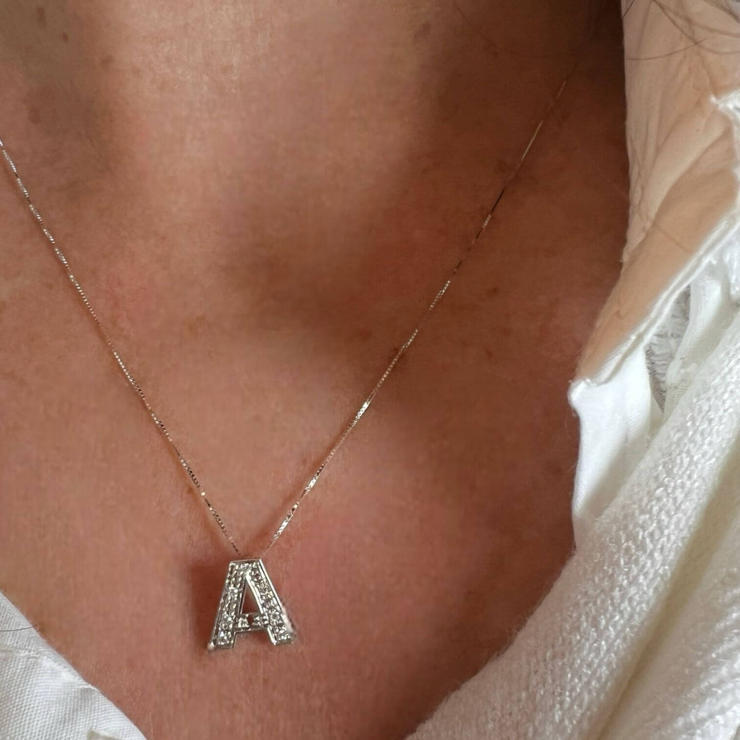 Pendente iniziale A oro bianco e diamanti art. LT-A