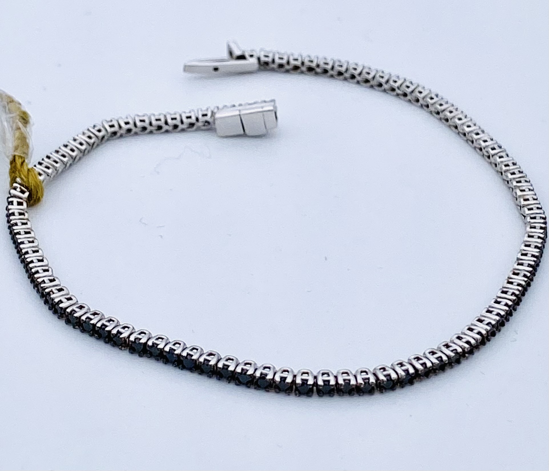 bracciale-tennis-diamanti-neri-oro-bianco-750-cipolla-dal-1950-gioiellieri-palermo