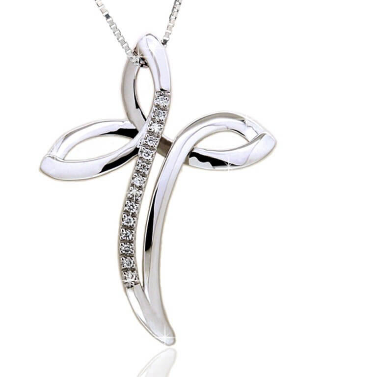 Cross pendant in white gold and diamonds.
