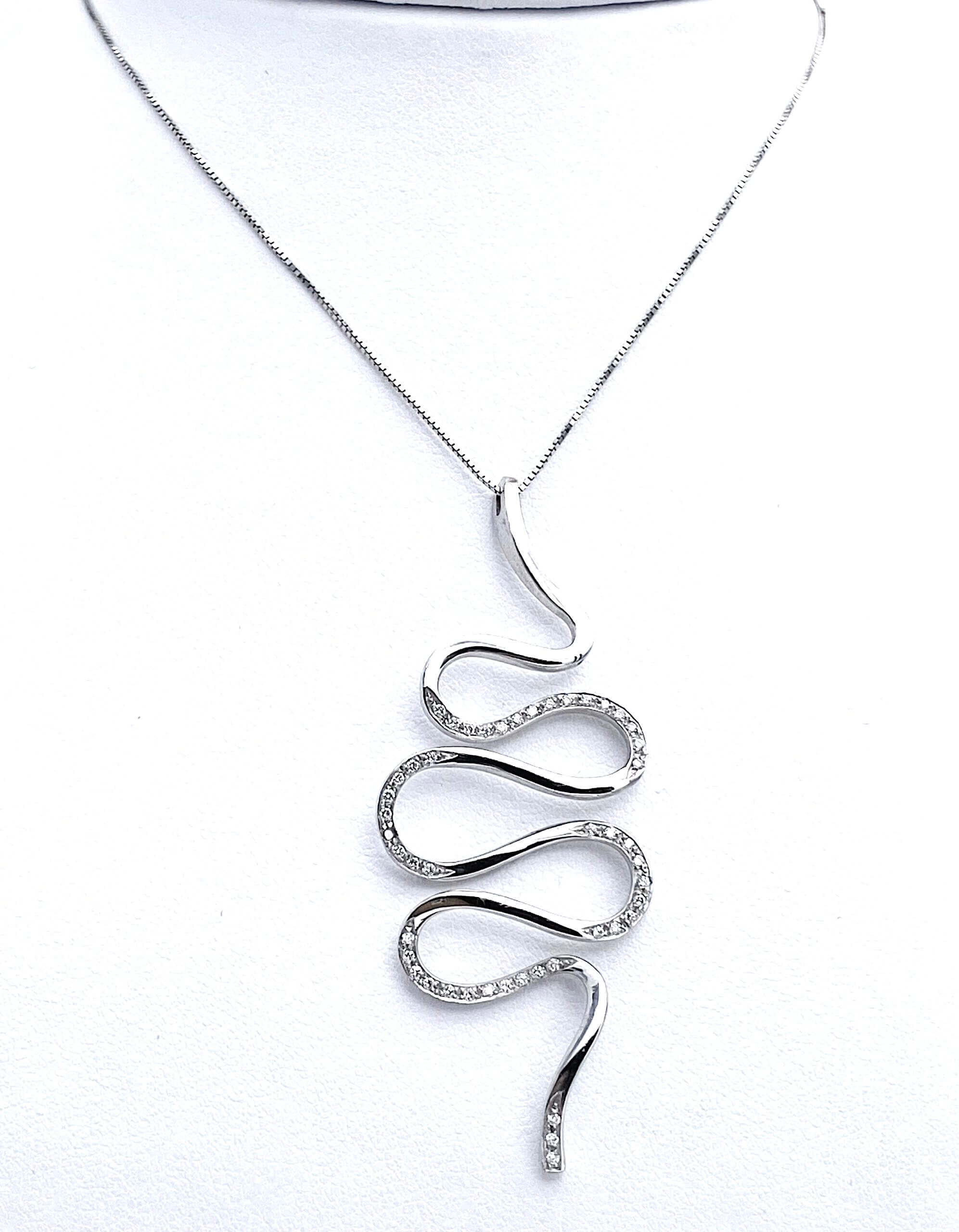Pendente serpente oro bianco e  diamanti Art.P217/280